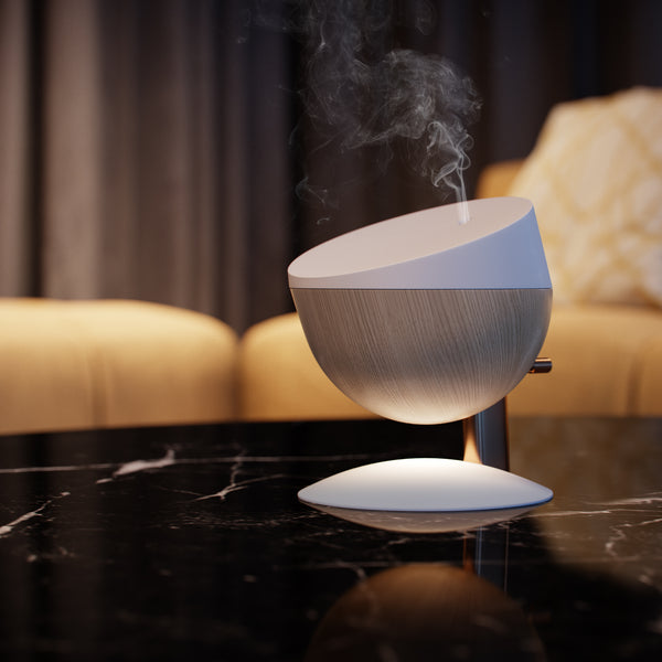 Diffuseur Arty diffusant de la vapeur, créant une atmosphère apaisante et relaxante grâce aux huiles essentielles.
