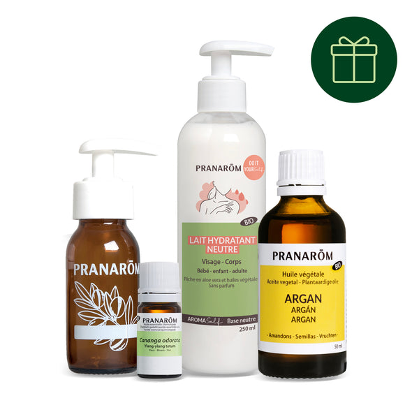 Coffret Pranarôm avec lait hydratant neutre, huile d'argan, d'ylang ylang et et flacon pompe.