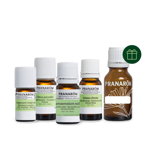 Lot d'huiles essentielles, huile végétale et flacon pour une recette coupe-faim.