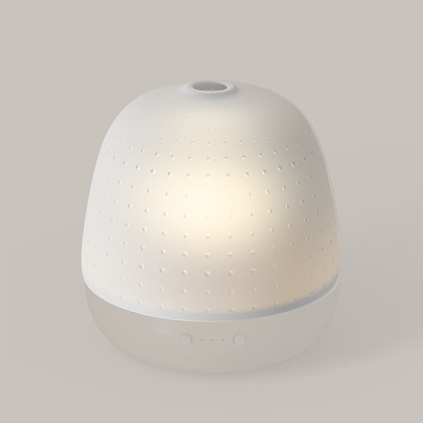 Diffuseur Cera Dôme Punti Pranarôm sur un fond clair.