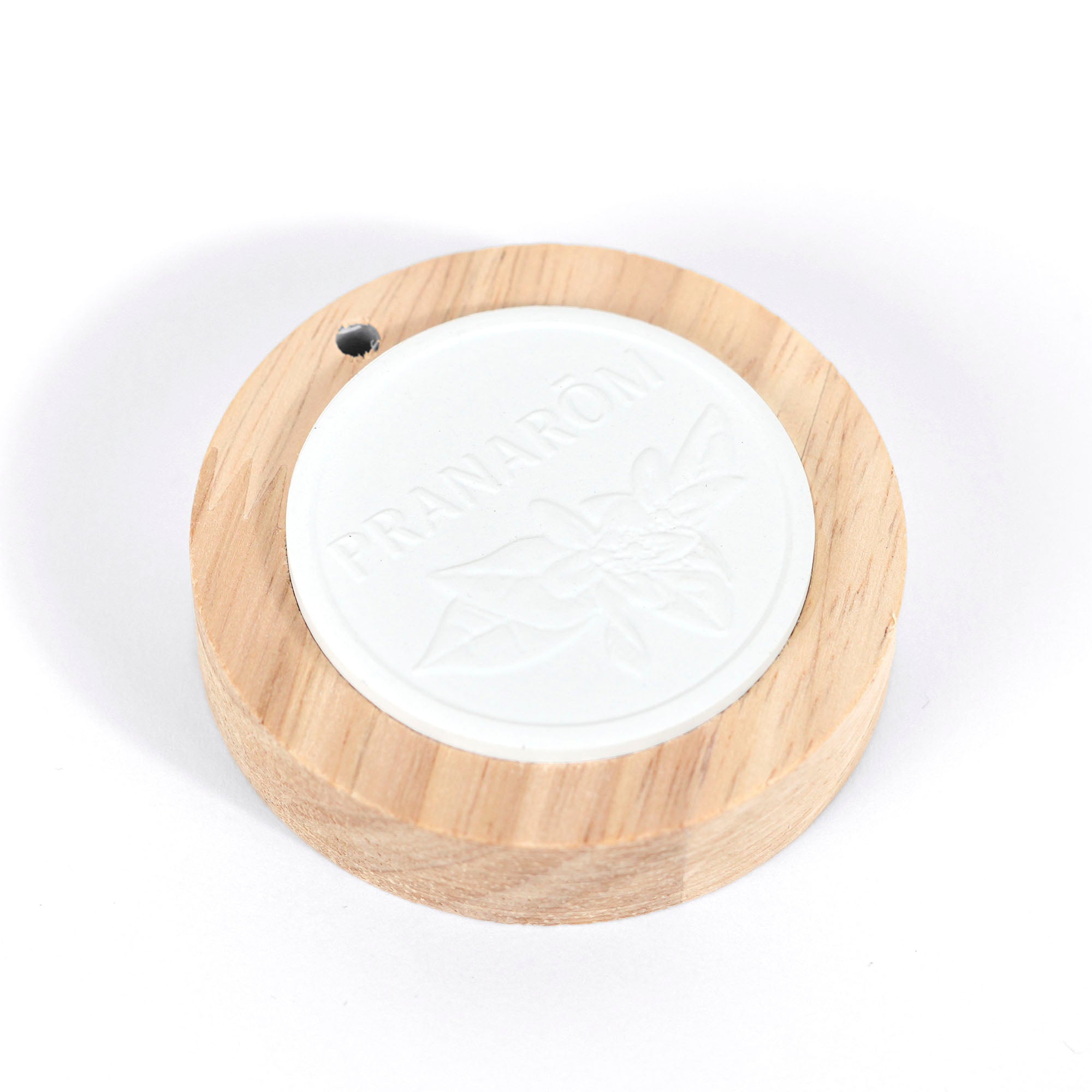 Galet de céramique avec une partie en bois pour les diffuseurs d'huiles essentielles de Pranarôm.