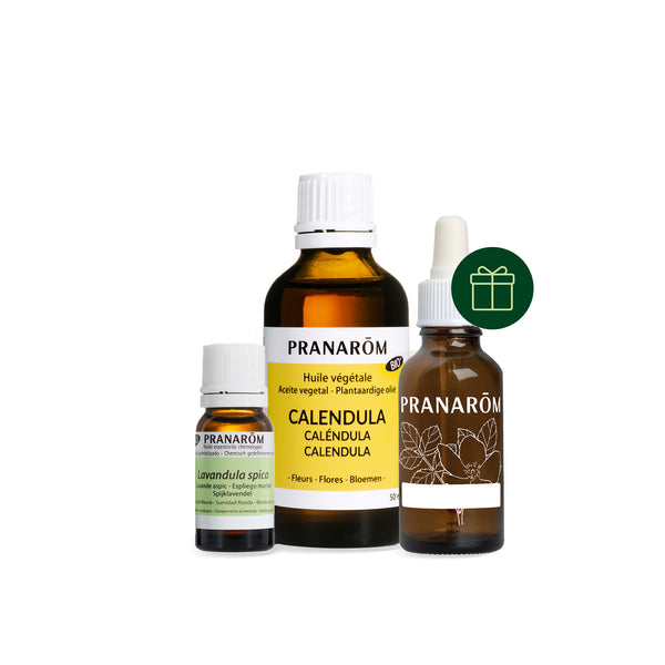 Lot d'huile essentielle, huile végétale et flacon pour une recette après-soleil.